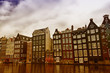 Photo: Channels and historic buildings in Amsterdam. Typical Amsterdam Channels and historic buildings in Amsterdam. Typical Amsterdam