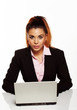Attractive businesswoman sitting at her desk