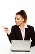 Businesswoman pointing off frame