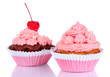 Delicious beautiful cupcakes isolated on white