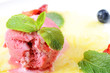 Strawberry ice-cream with pineapples and mint