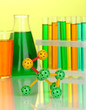 Photo: Molecule model and test tubes with colorful liquids Molecule model and test tubes with colorful liquids