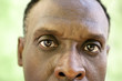 Photo: Portrait of serious old black man looking at camera Portrait of serious old black man looking at camera