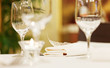 Photo: Tables set for meal Tables set for meal