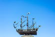 Isolated sailing ship on a blue sky