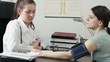 Female doctor measure blood pressure, tracking shot