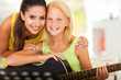 music tutor and preteen girl with a guitar