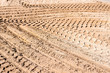 Tire tracks prints in sand