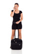 young female business traveler talking on cell phone
