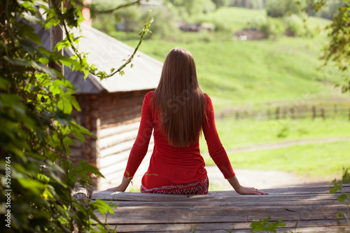 Photo: Slim girl sitting and resting Slim girl sitting and resting