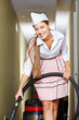 Photo: Putrzfrau mit Staubsauger im Hotel Putrzfrau mit Staubsauger im Hotel