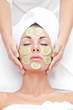 Photo: portrait of young beautiful woman being treated portrait of young beautiful woman being treated