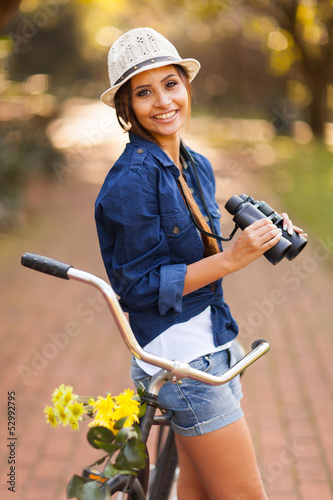 Photo: happy woman with binoculars outdoors happy woman with binoculars outdoors