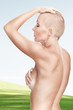 Foto: Portrait of nice young naked woman on color back Portrait of nice young naked woman on color back