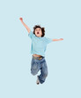 Adorable child jumping