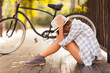 Photo: sad young woman sitting at the park sad young woman sitting at the park