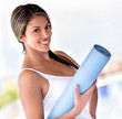 Woman with a yoga mat