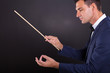 music conductor with eyes closed
