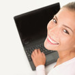 Laptop woman smiling working on computer pc