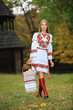 Photo: Portrait of beautiful young woman in Ukrainian style clothing Portrait of beautiful young woman in Ukrainian style clothing