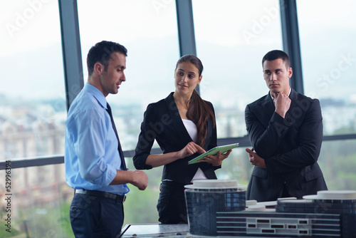 Photo: business people and engineers on meeting business people and engineers on meeting