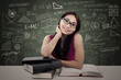 Attractive female study in class