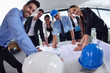 Photo: business people and engineers on meeting business people and engineers on meeting