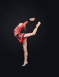 Photo: Young woman in gymnast suit posing Young woman in gymnast suit posing