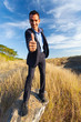 young successful businessman giving thumb up