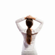 Young woman standing with back