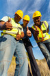 construction workers giving thumbs up