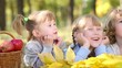 Happy children playing outdoors in autumn park. Dolly shot