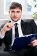 male psychologist  being ready to take notes
