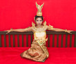 Foto: Thai woman resting on a bed Thai woman resting on a bed