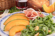 Photo: plate of fresh salad with melon,ham and lettuce plate of fresh salad with melon,ham and lettuce
