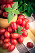 Vintage mug full of fresh cherry tomatoes