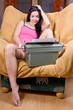 beauty girl with old typewriter sitting on the chair