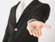 man holding house keys