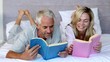 Couple reading books in the bedroom