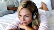 Calm woman closing her eyes while listening to music