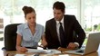 Video: Business people examining a document in the office Business people examining a document in the office