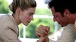 Video: Businesswoman and businessman arm wrestling Businesswoman and businessman arm wrestling
