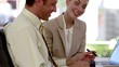 Business man and woman speaking together