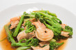 prawns with broccoli fried sauce on white dish