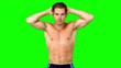 Shirtless man flexing muscles