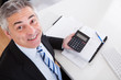 Mature Businessman At Work