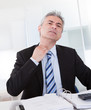 Mature Businessman Feeling Uncomfortable