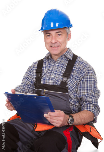 Photo: Technician Holding Laptop Technician Holding Laptop