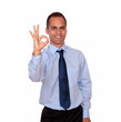Positive man looking and showing you ok sign