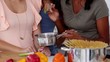 Video: Three friends cooking a tasty meal with vegetables Three friends cooking a tasty meal with vegetables